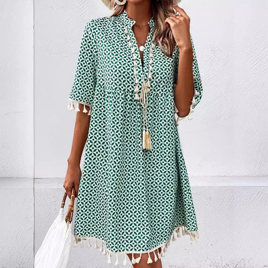Eline – Trendy zomerjurk met opvallende print en elegante V-hals