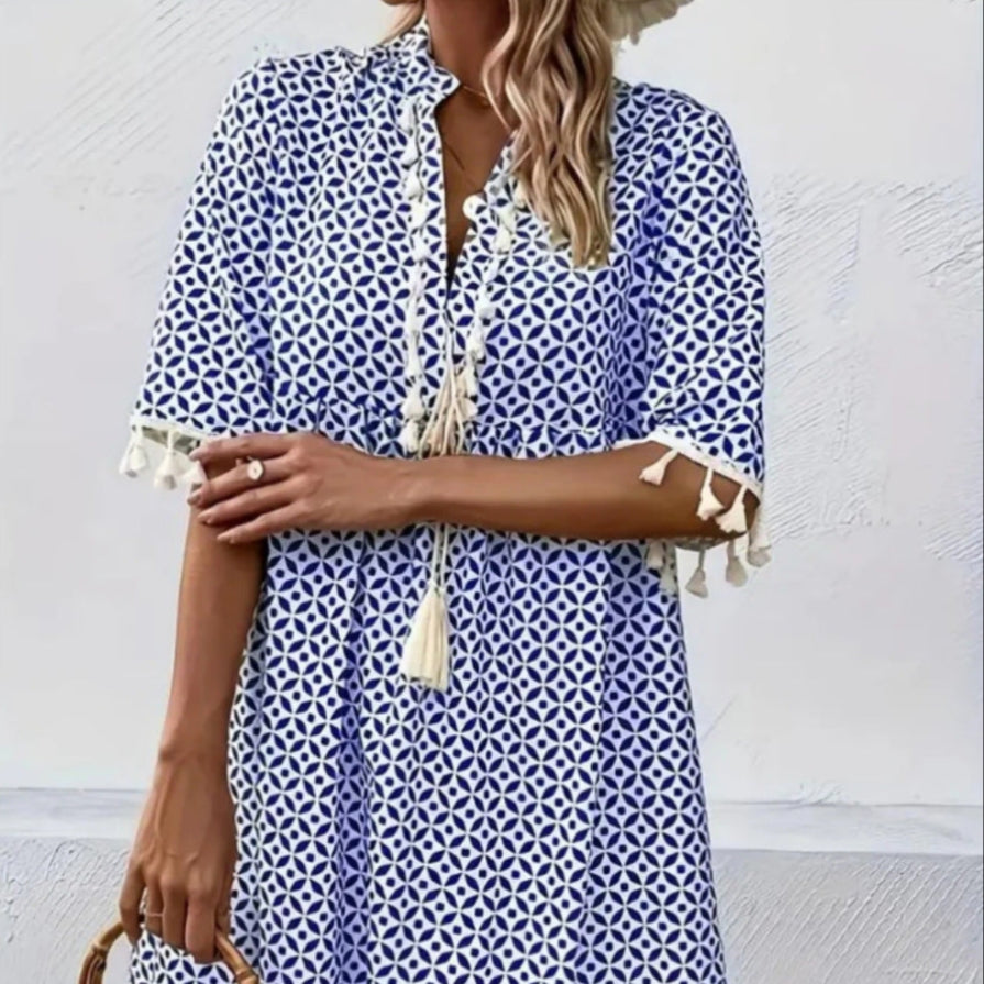 Eline – Trendy zomerjurk met opvallende print en elegante V-hals