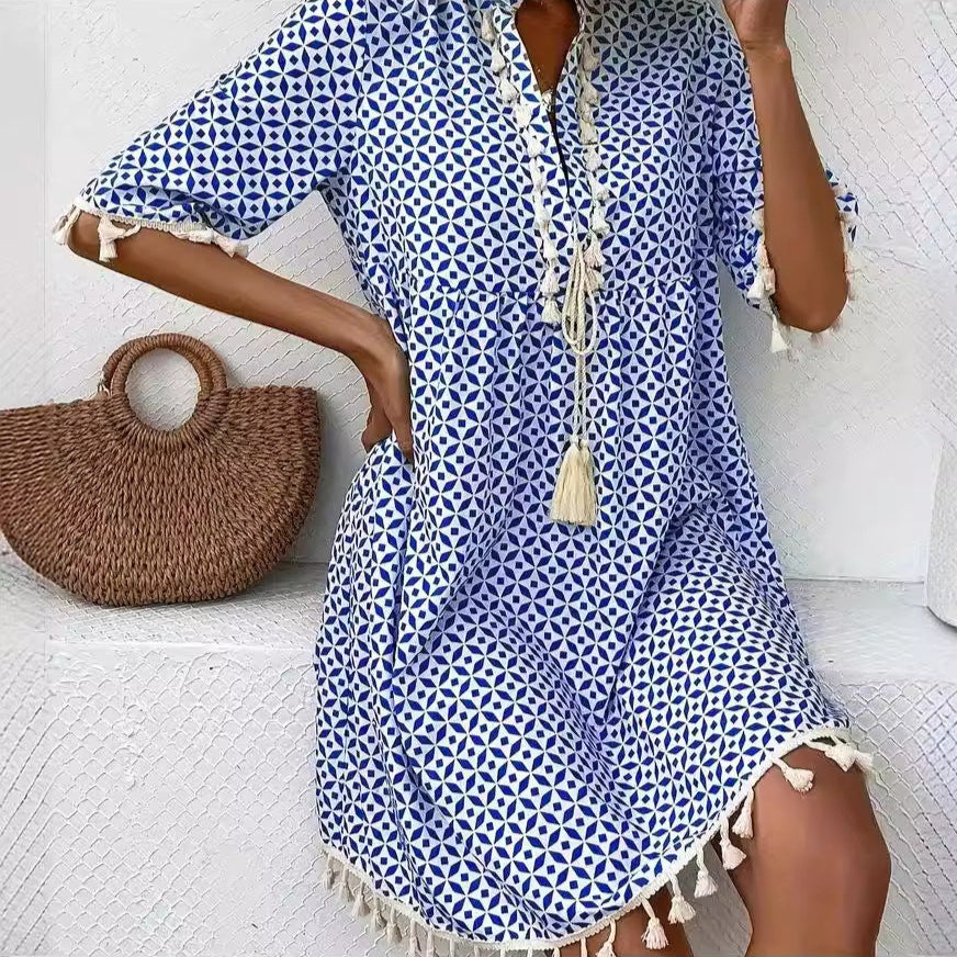 Eline – Trendy zomerjurk met opvallende print en elegante V-hals