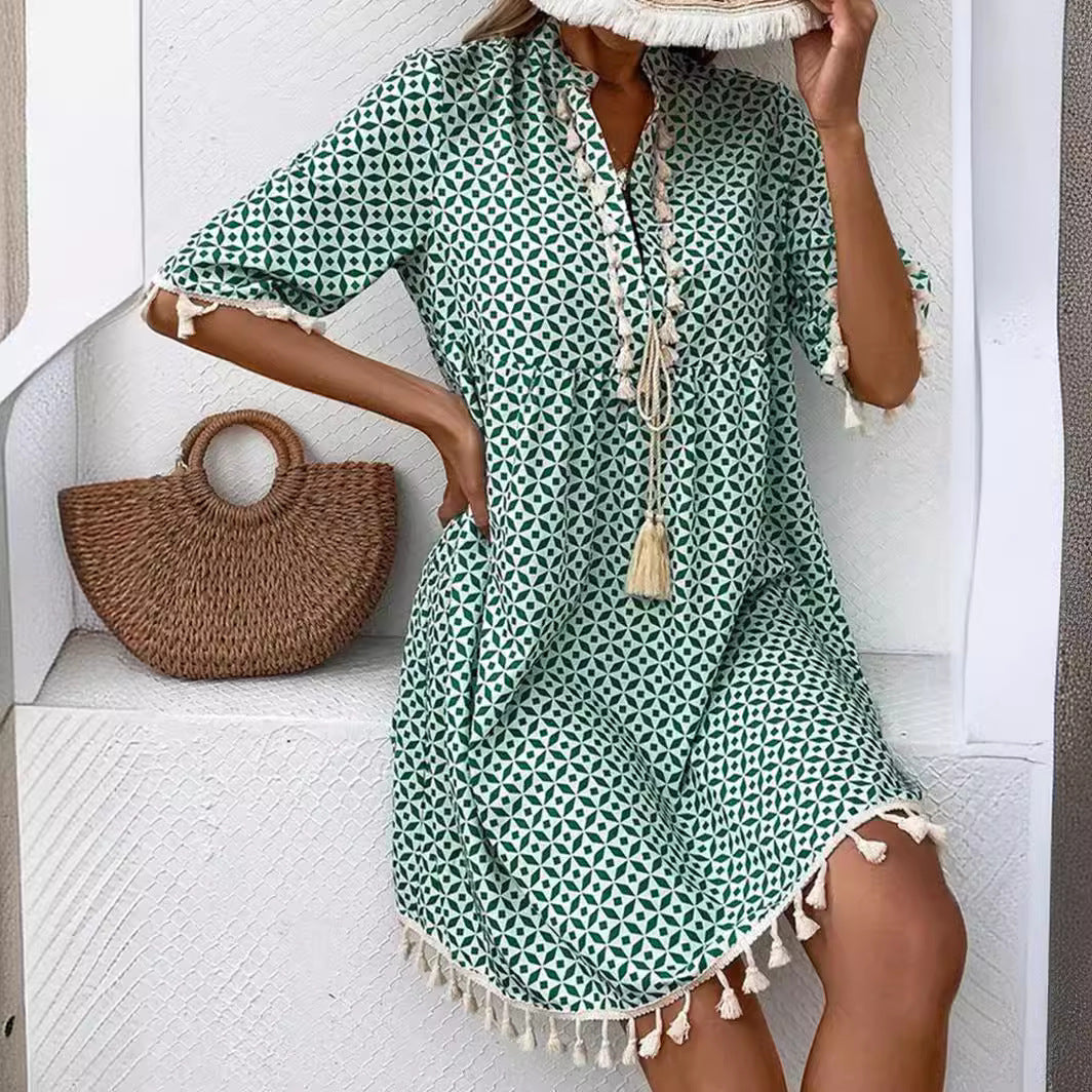 Eline – Trendy zomerjurk met opvallende print en elegante V-hals