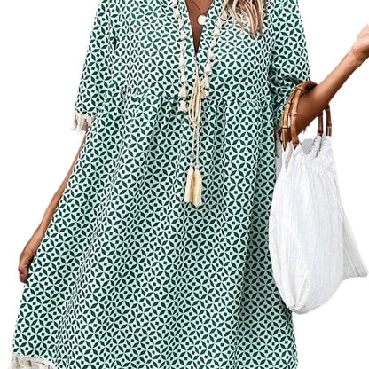 Eline – Trendy zomerjurk met opvallende print en elegante V-hals