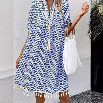 Eline – Trendy zomerjurk met opvallende print en elegante V-hals