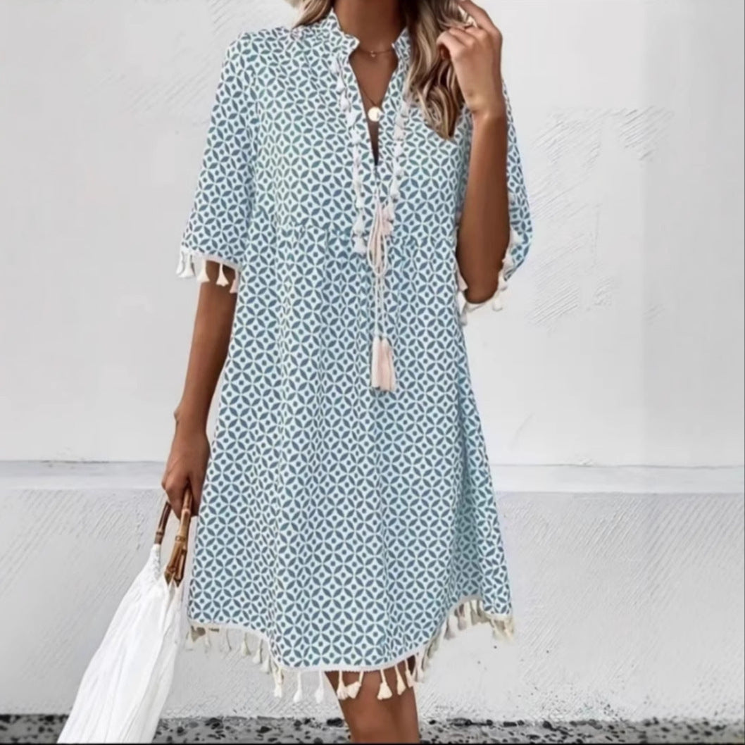 Eline – Trendy zomerjurk met opvallende print en elegante V-hals